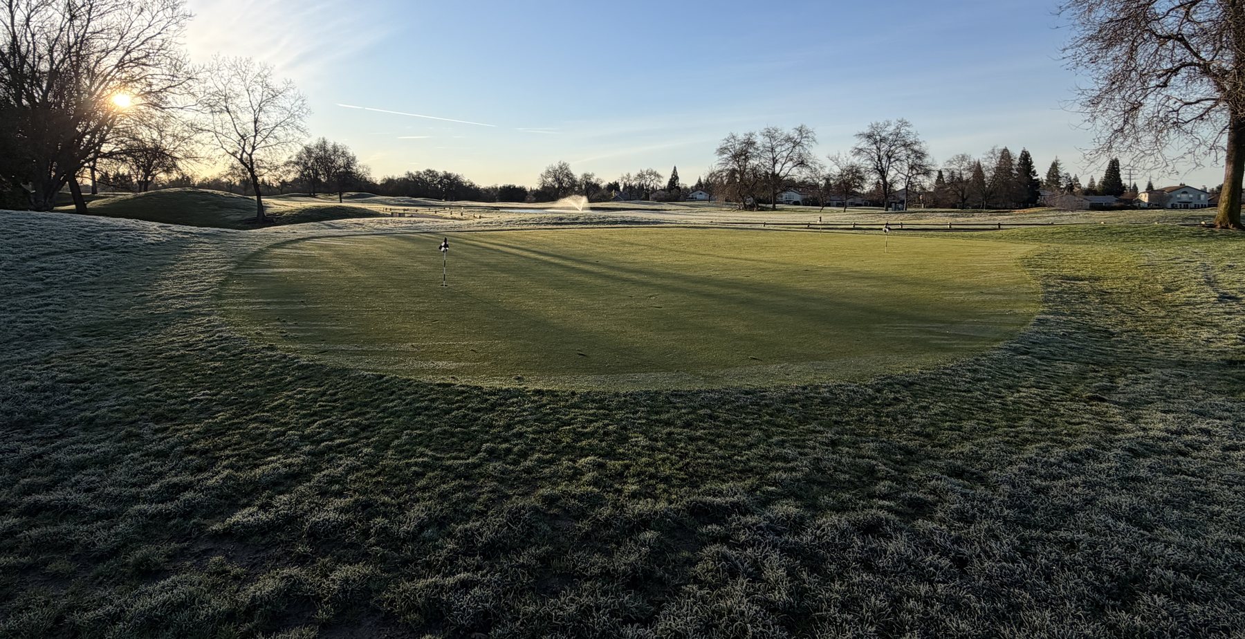 First light across a frosted green at Woodcreek